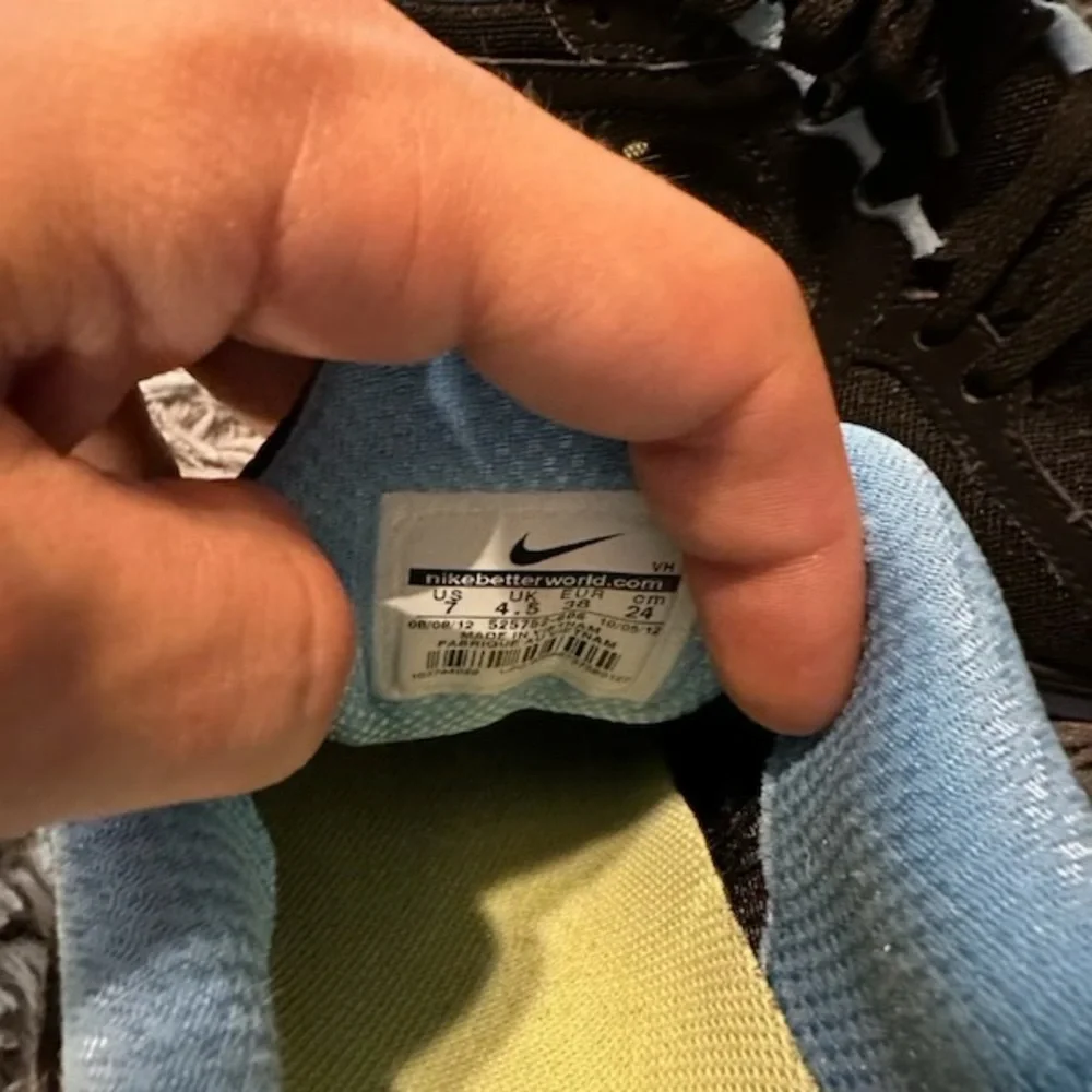 Nike Black and Light Blue Athletic Shoes